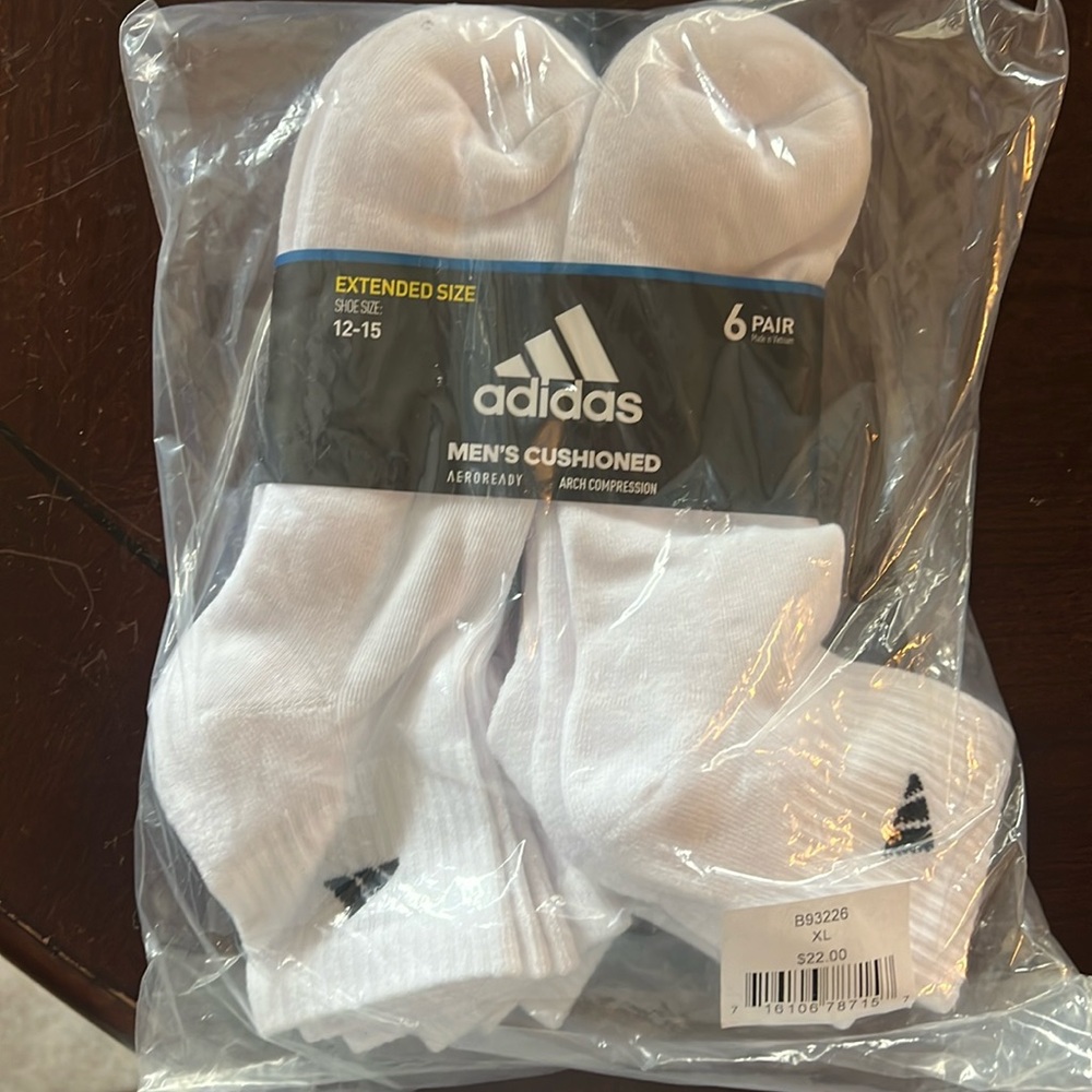 New, in packaging, Adidas men’s quarter length socks.